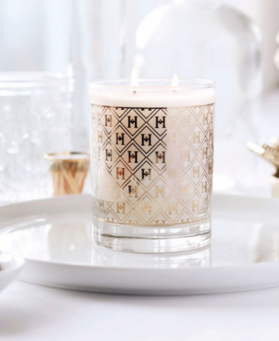 22k Gold Speakeasy Candle on a white tray.