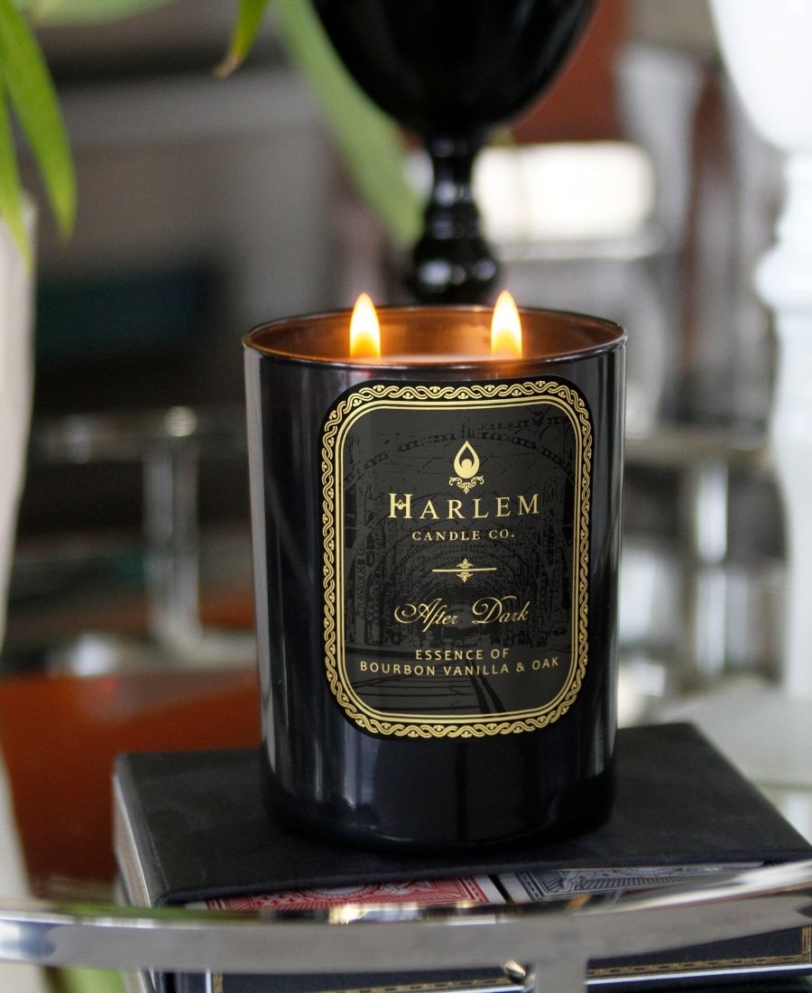 After Dark Candle on a glass table.