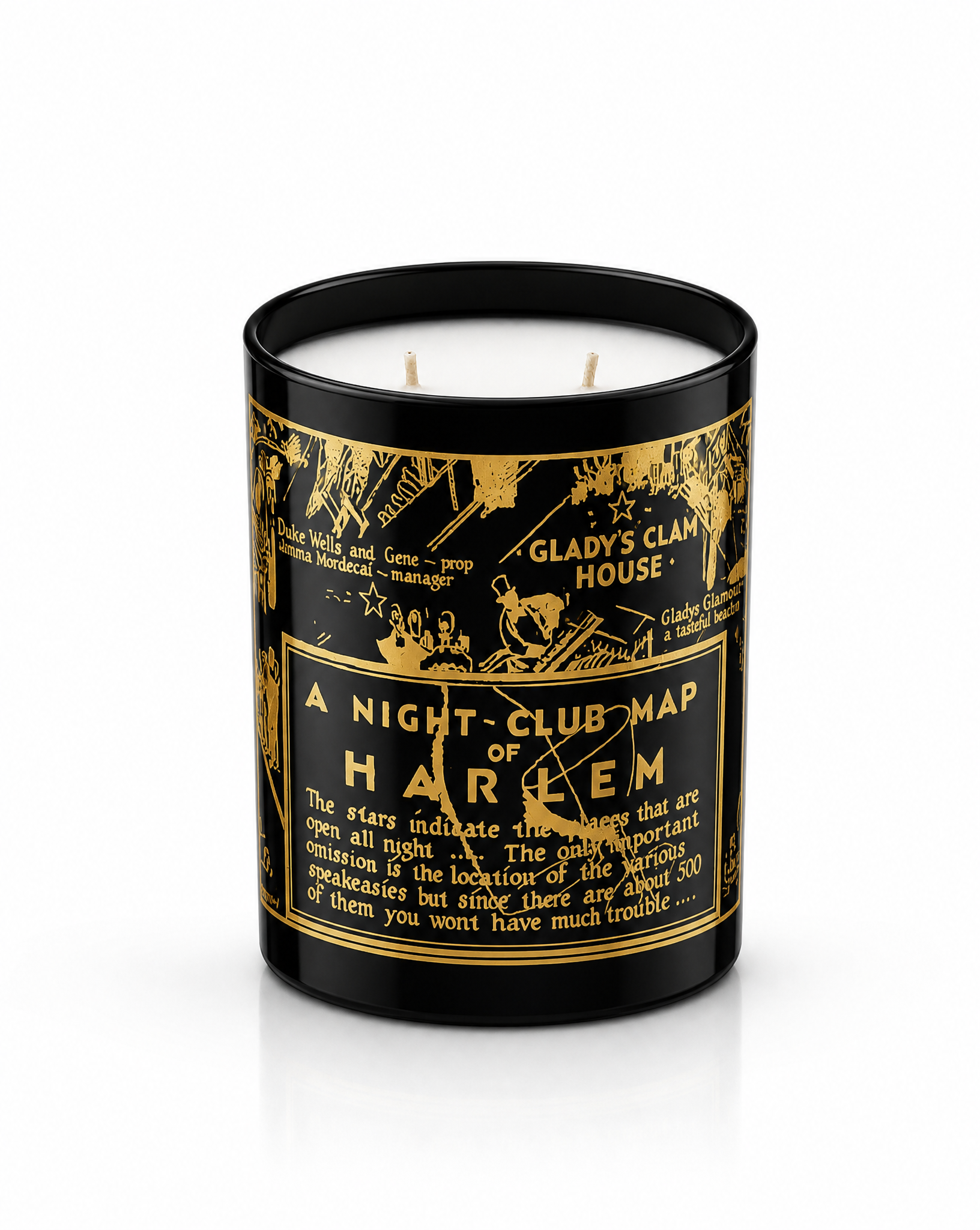 A black glass jar candle with two wicks, featuring a gold illustrated label titled 'A Night-Club Map of Harlem' with vintage-style text and illustrations.
