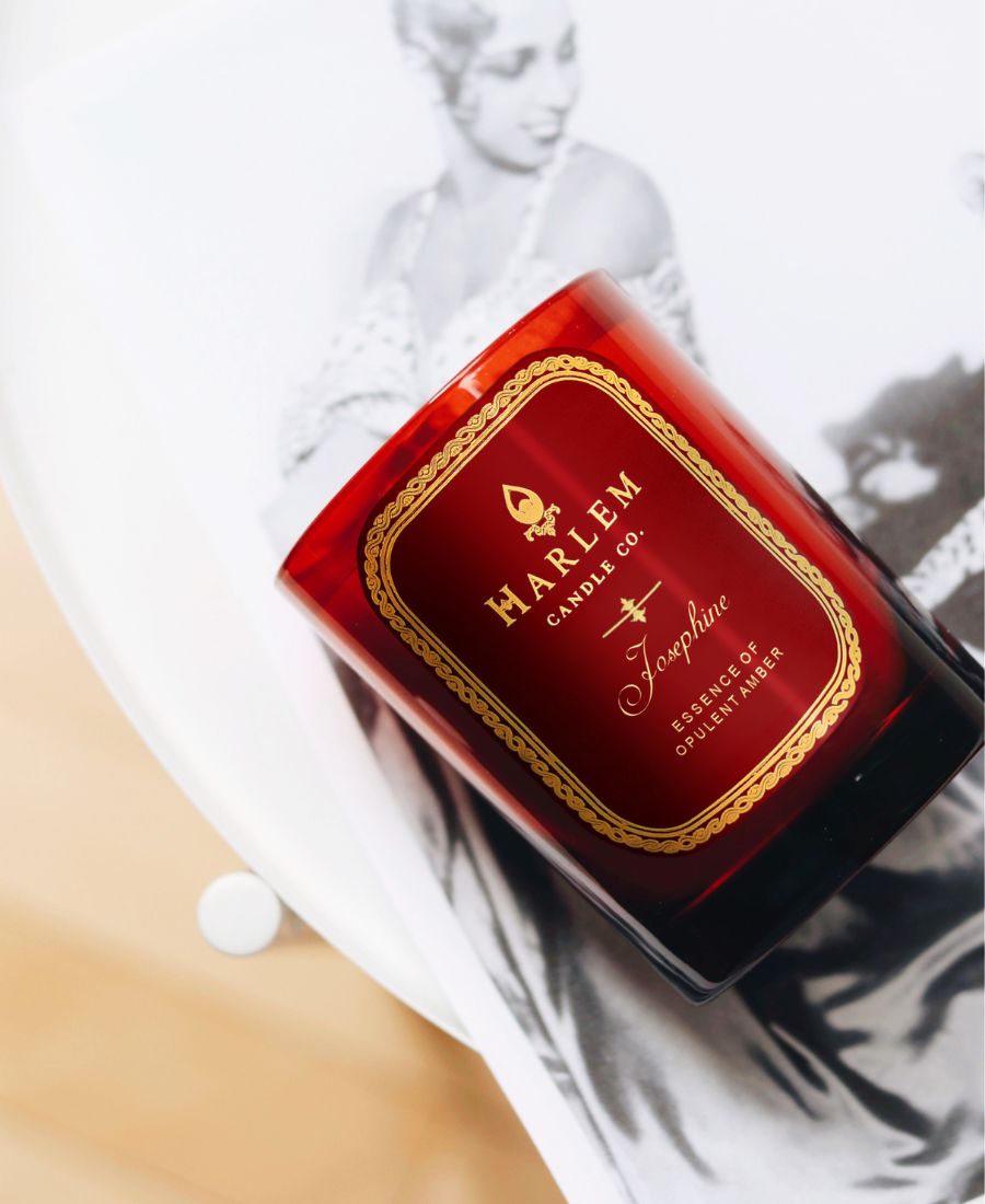 Harlem Candle Co. Josephine candle with decorative label on a white photograph background