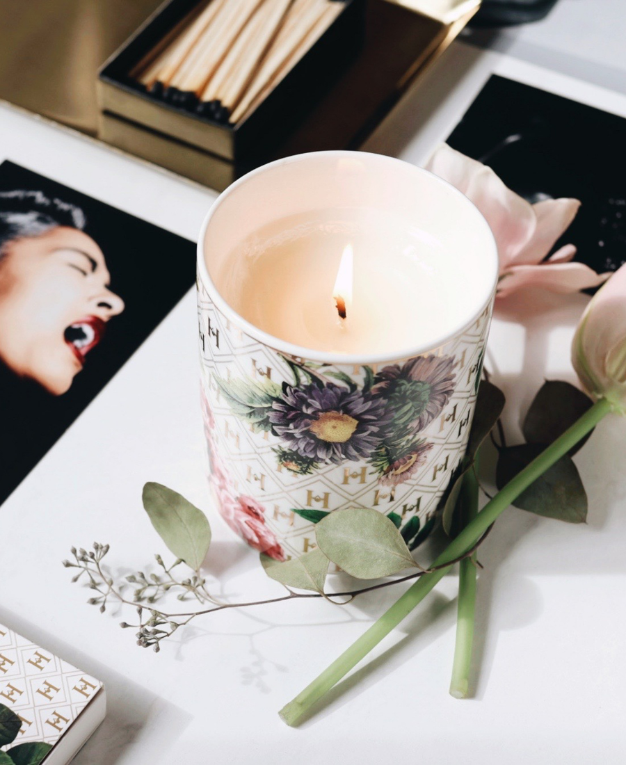 Lady Day Ceramic Candle on a white table with flowers, matches, and a photograph of Billie Holiday.