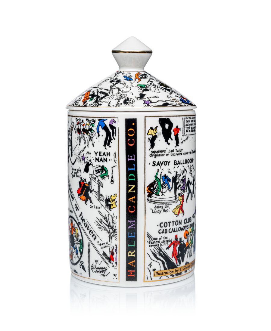 This is an image of our night club map of Harlem candle in black-and-white with pops of color. This candle has a dome lid and is Fragrance with the Langston scent. This is the opposite side of the candle that shows the Harlem Candle Company words with red, orange, yellow, green, blue, purple colors