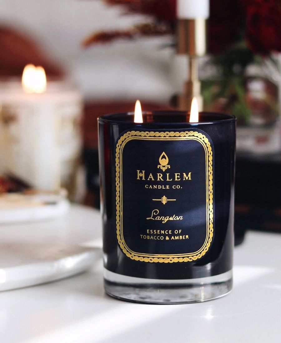 Langston Candle on a white table.