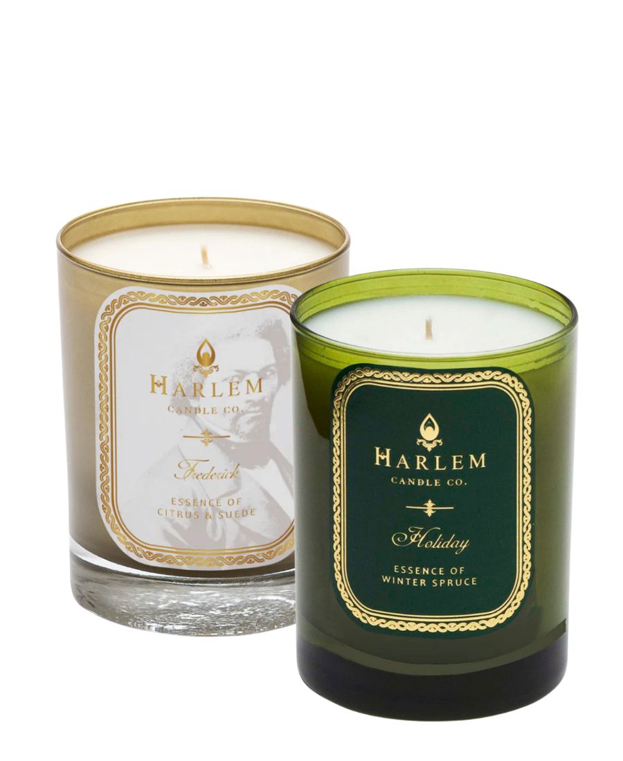 Two candles from Harlem Candle Co. on a white background