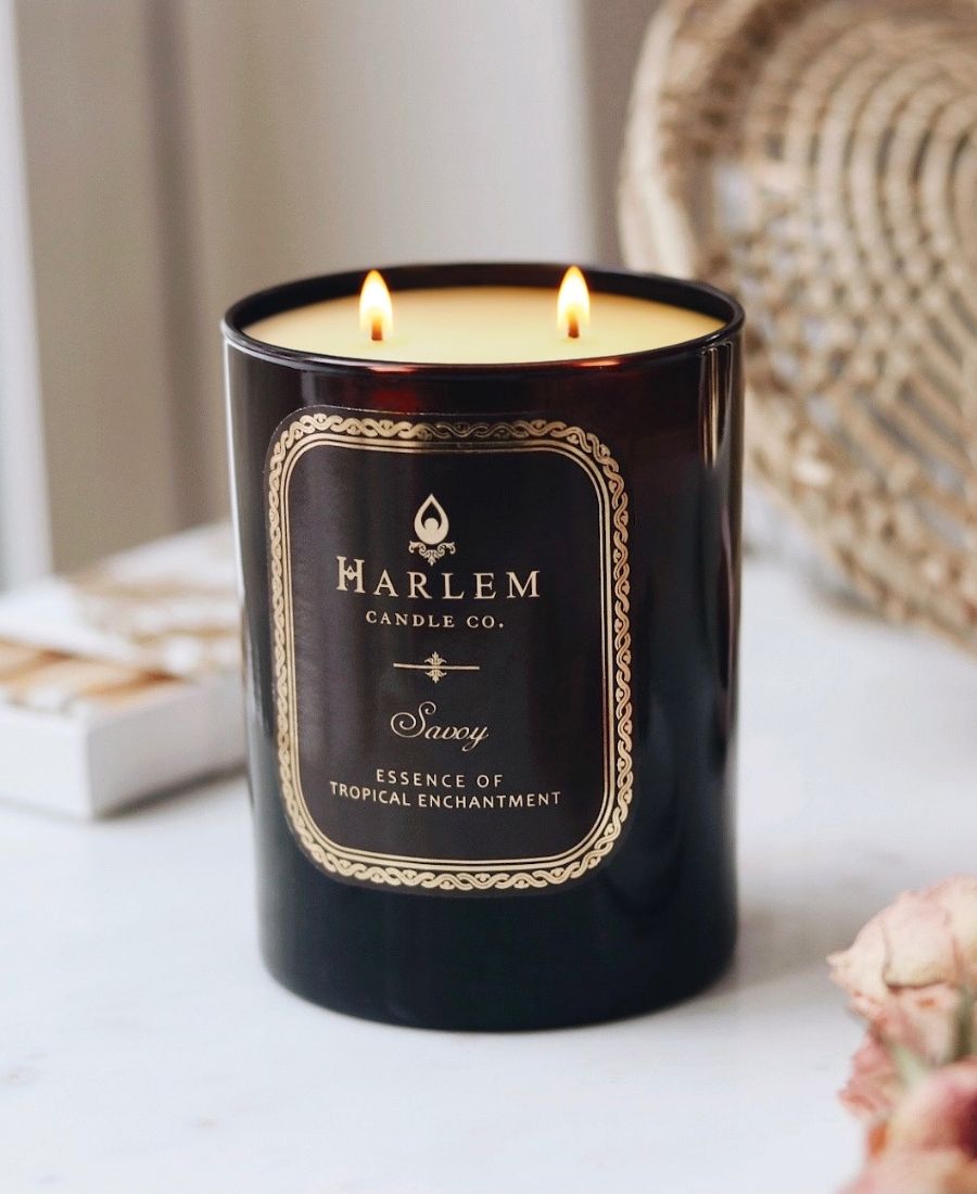 Savoy Candle on a white table.