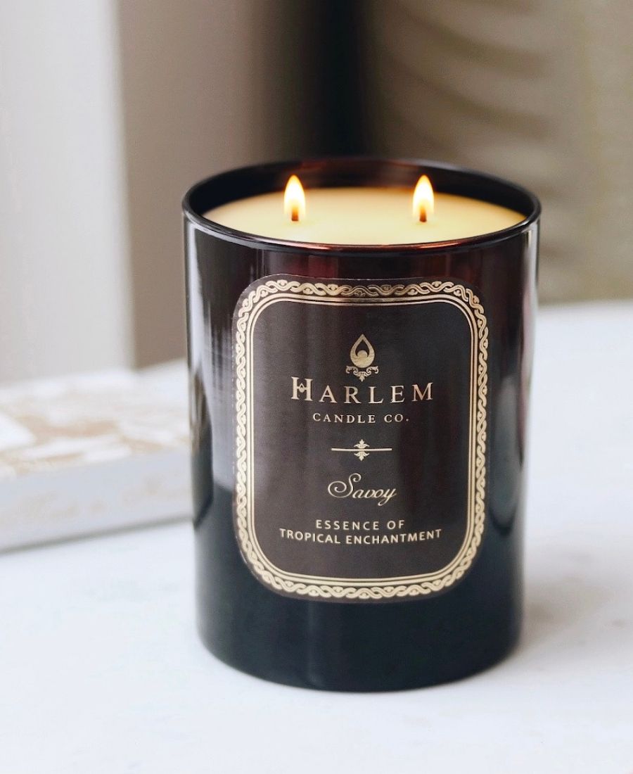 Savoy Candle on a white table.