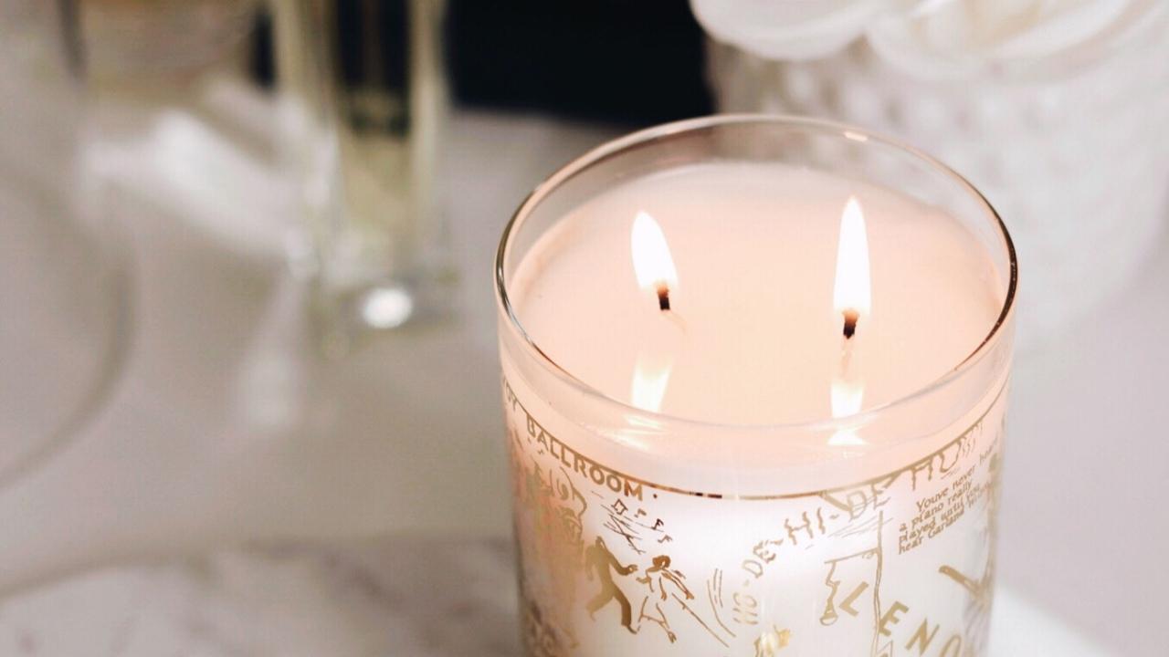even burning Savoy candle from the Harlem Candle Company 22k gold cocktail glass collection 