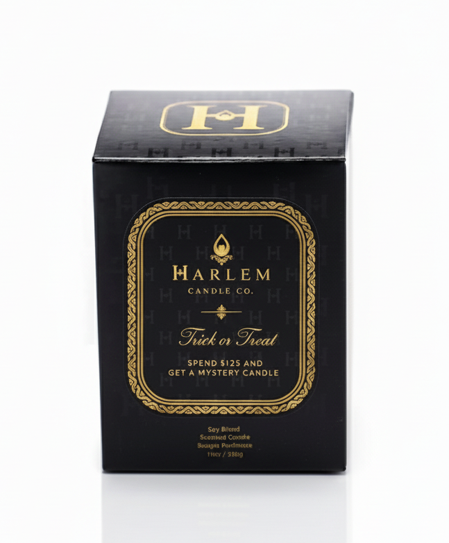 Black box with gold accents from Harlem Candle Co. on a white background