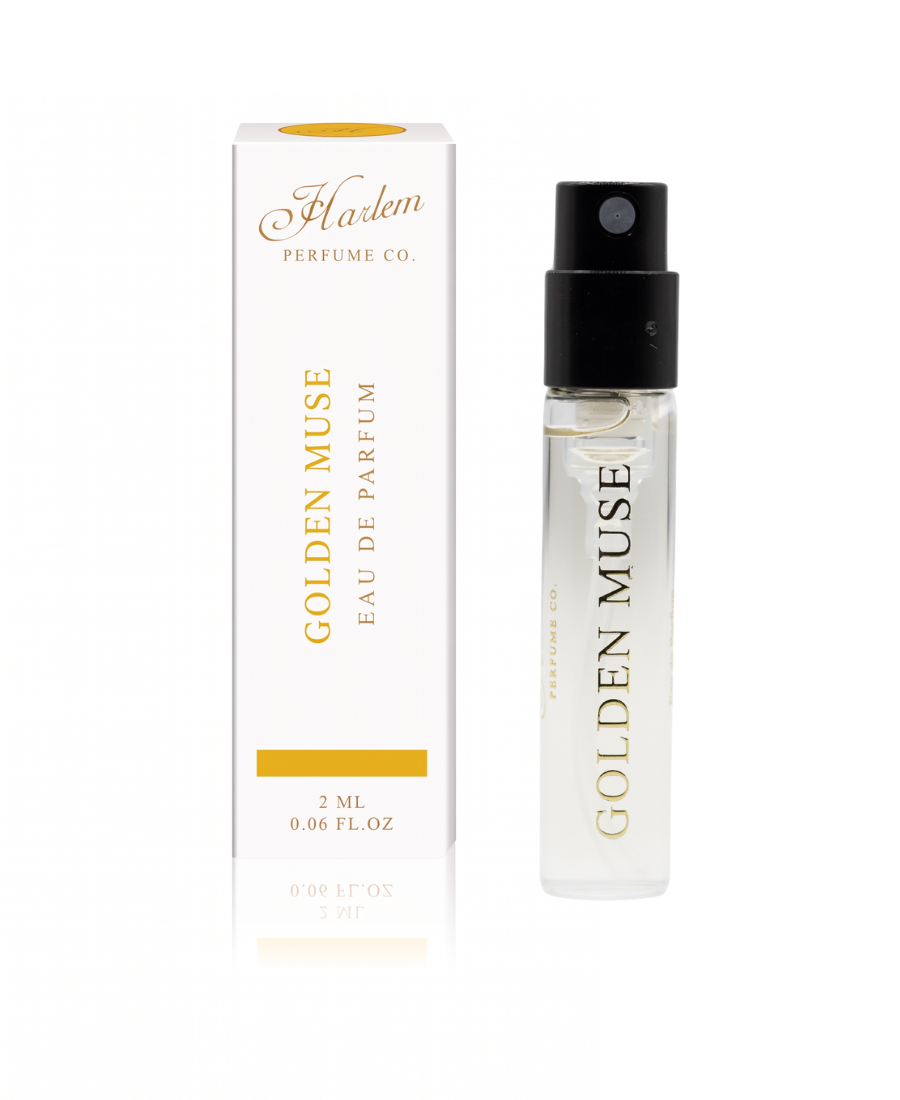 This is an image of our Golden Muse 2ml perfume vial next to its box.