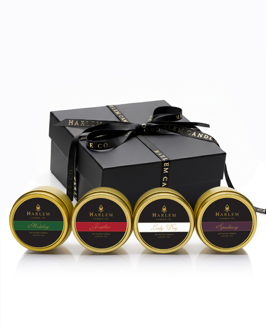 This is an image of our holiday travel candle set, which includes the holiday candle, the Josephine candle, the lady candle, and the speakeasy candle.