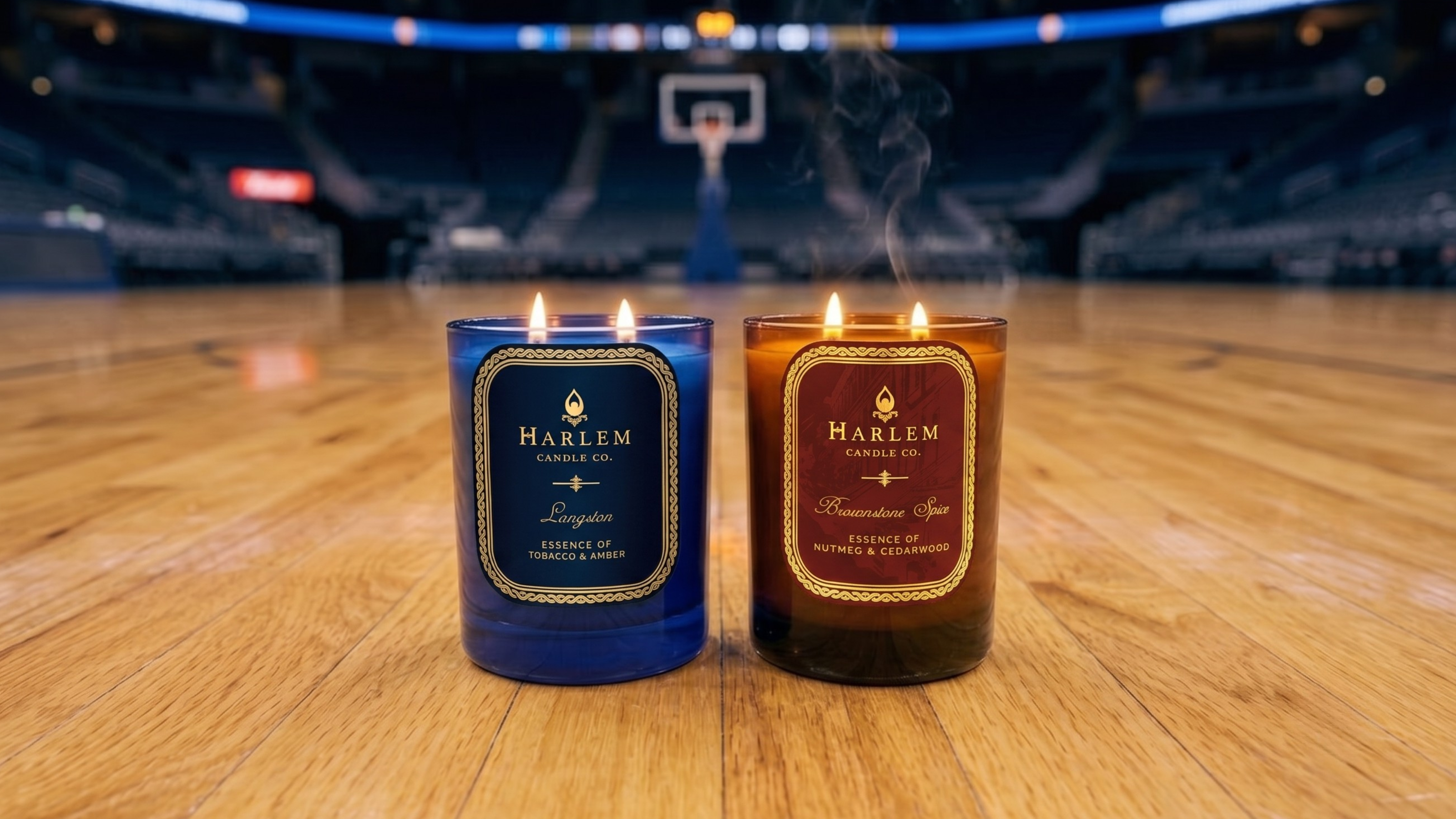 Two candles with 'Harlem' branding on a basketball court