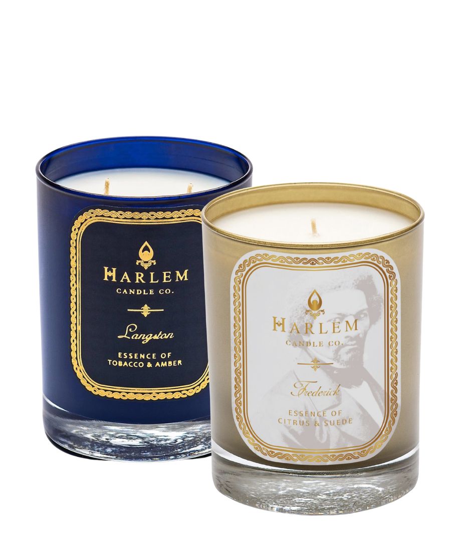 Two candles from Harlem Candle Co. on a white background