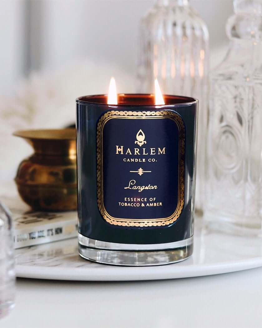 This is a Lifestyle image of the Langston candle with the flames illuminated.